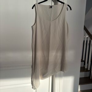 Eileen Fisher cream sleeveless long top with diagonal hem